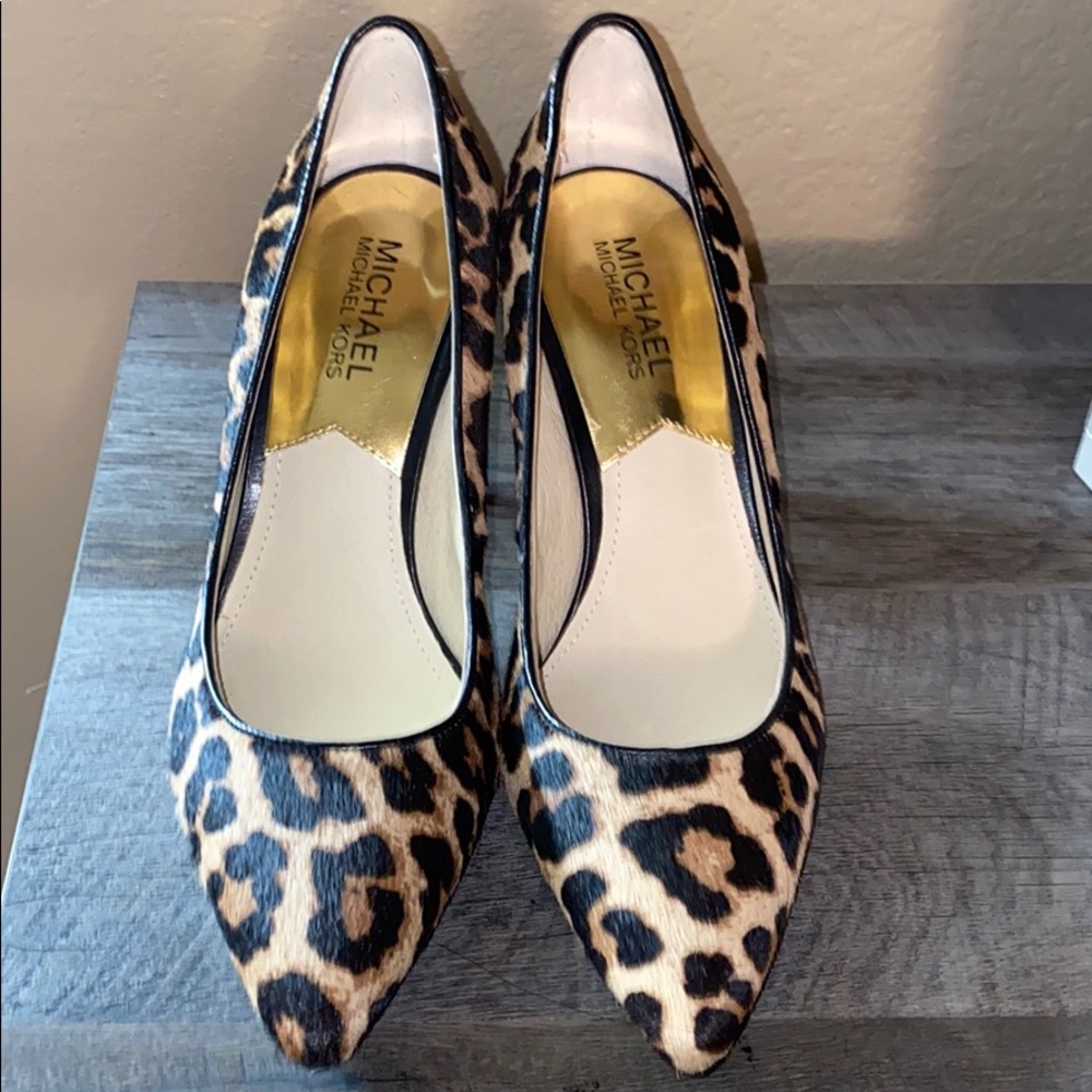 Never worn Micheal Kors cheetah heels